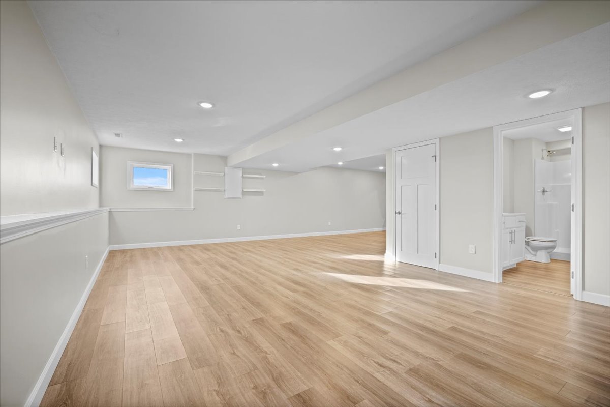 52 Winding Way Bloomington, IL 61705 - Photo 34 of 51 a view of empty room with wooden floor