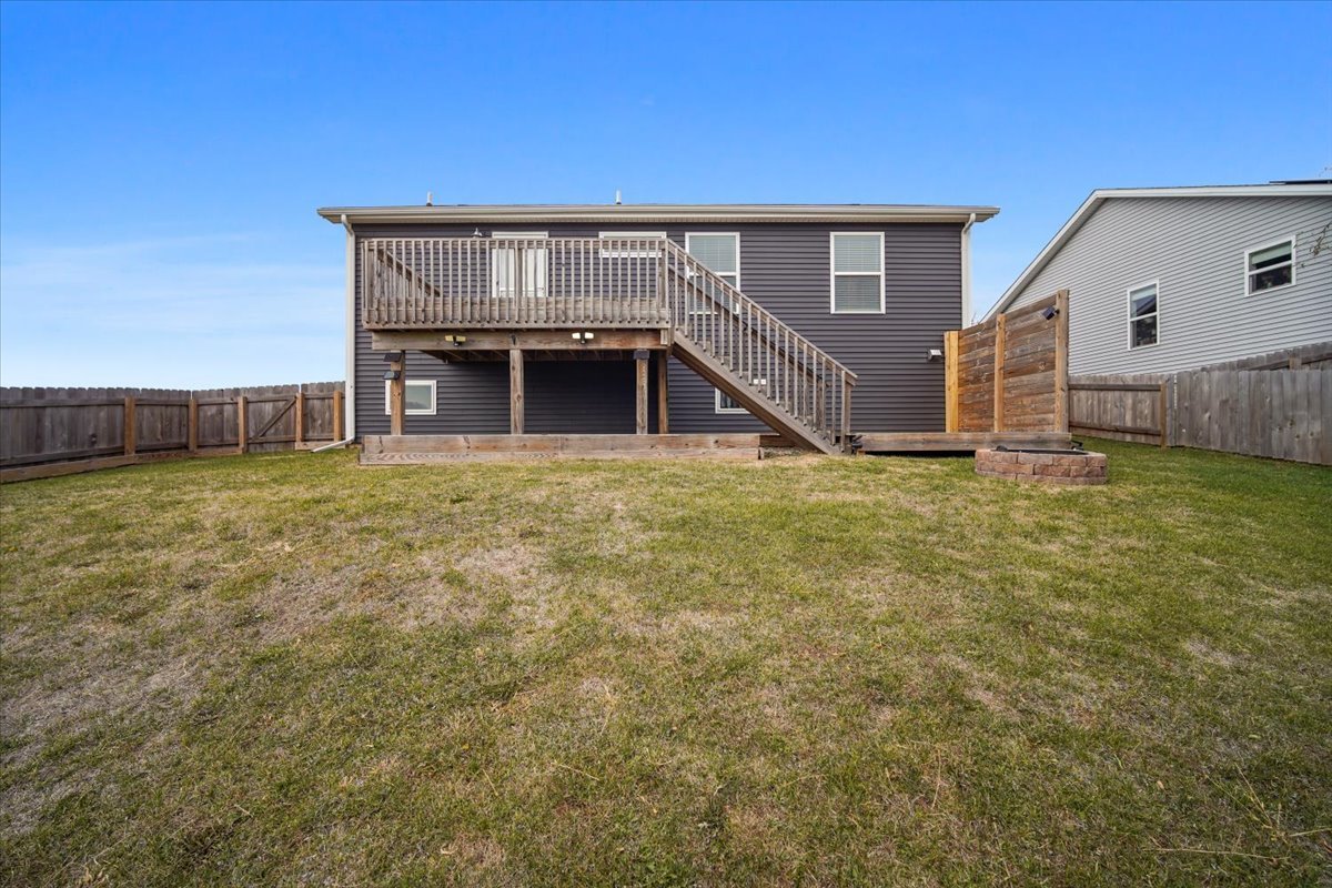 52 Winding Way Bloomington, IL 61705 - Photo 5 of 51 a view of a house with a yard