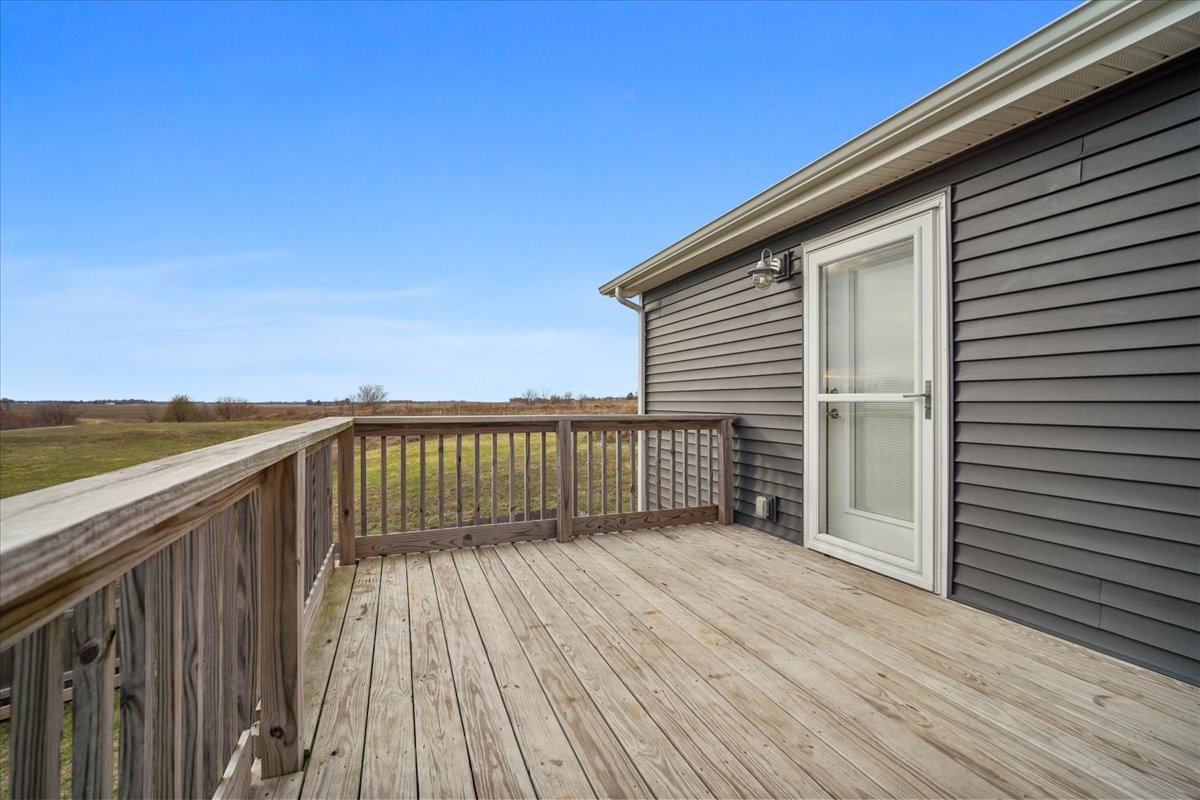52 Winding Way Bloomington, IL 61705 - Photo 8 of 51 a view of deck with wooden floor and fence