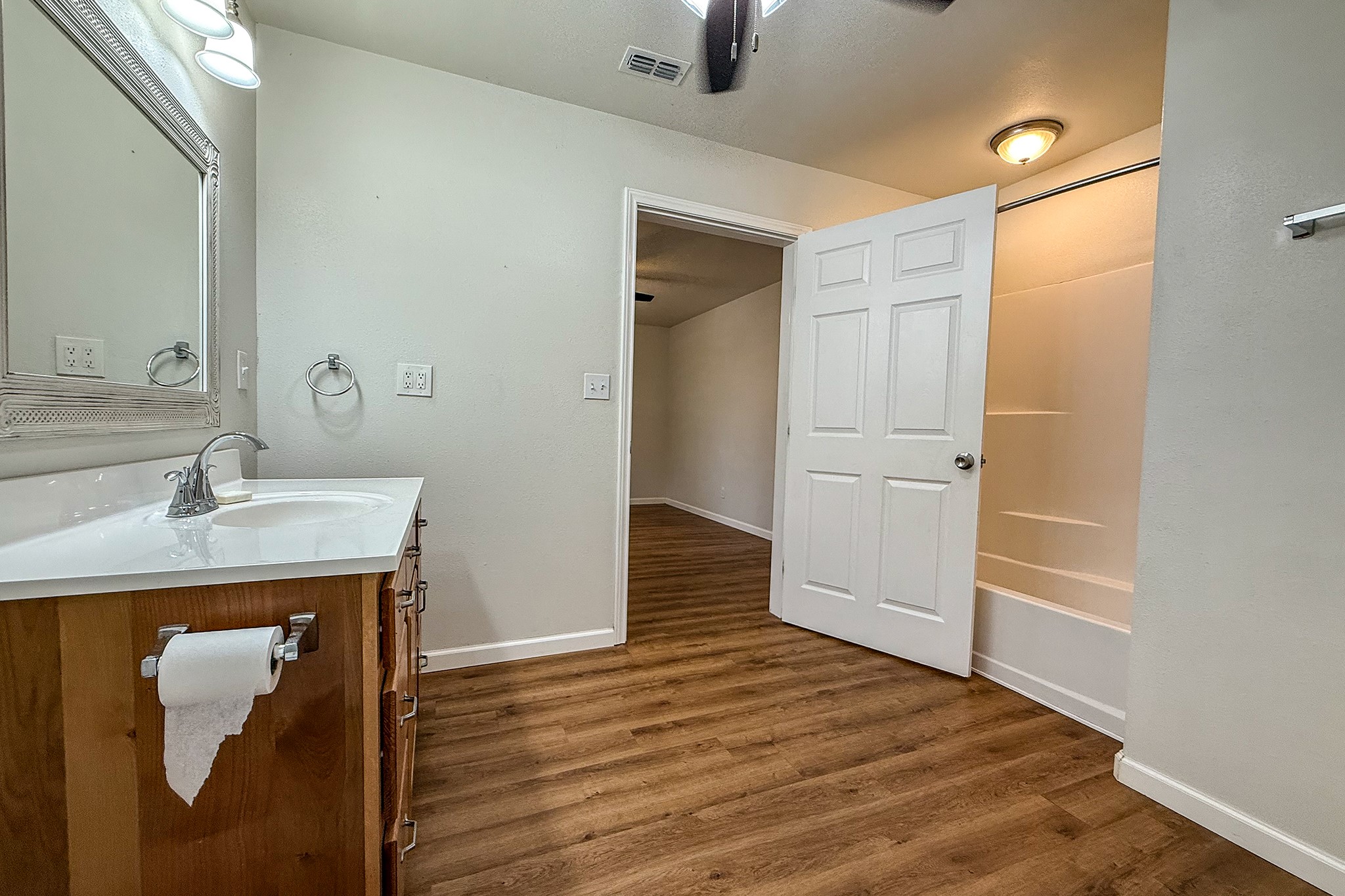 52 C Hank Benge Road Huntsville, TX 77320 - Photo 15 of 24 a bathroom with a sink and a mirror