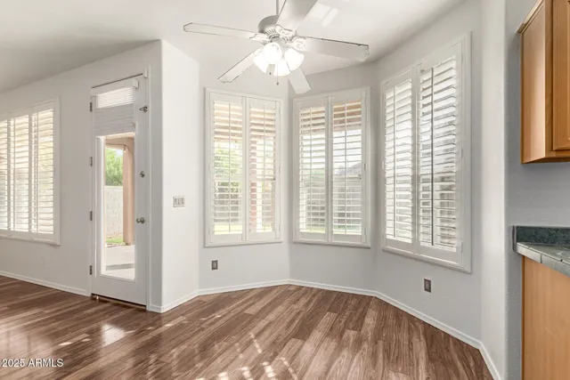 an empty room with a empty space and closet area