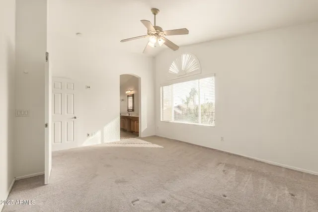 a view of a house with a yard and plants