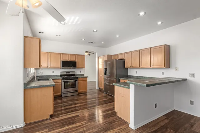 a living room with furniture fireplace and a flat screen tv