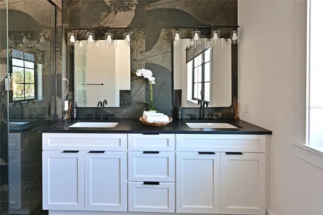 a spacious bedroom with a large bed and a window