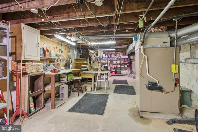 a view of storage and utility room