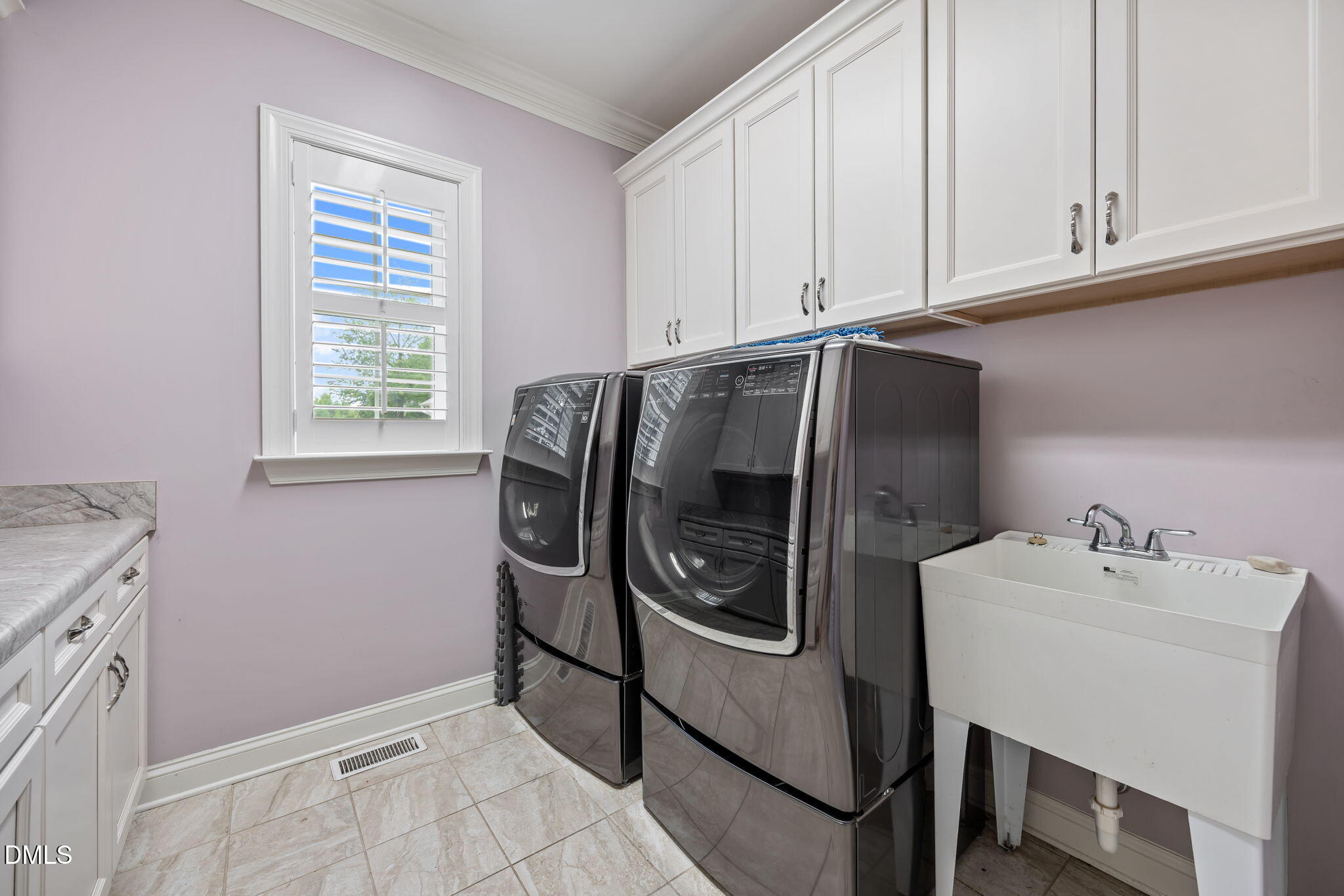 2880 Elevation Road Four Oaks, NC 27524 - Photo 39 of 51 a utility room with dryer and washer