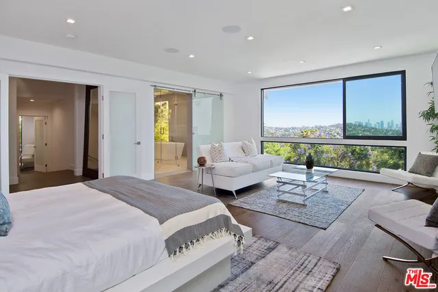 a workspace with furniture and window