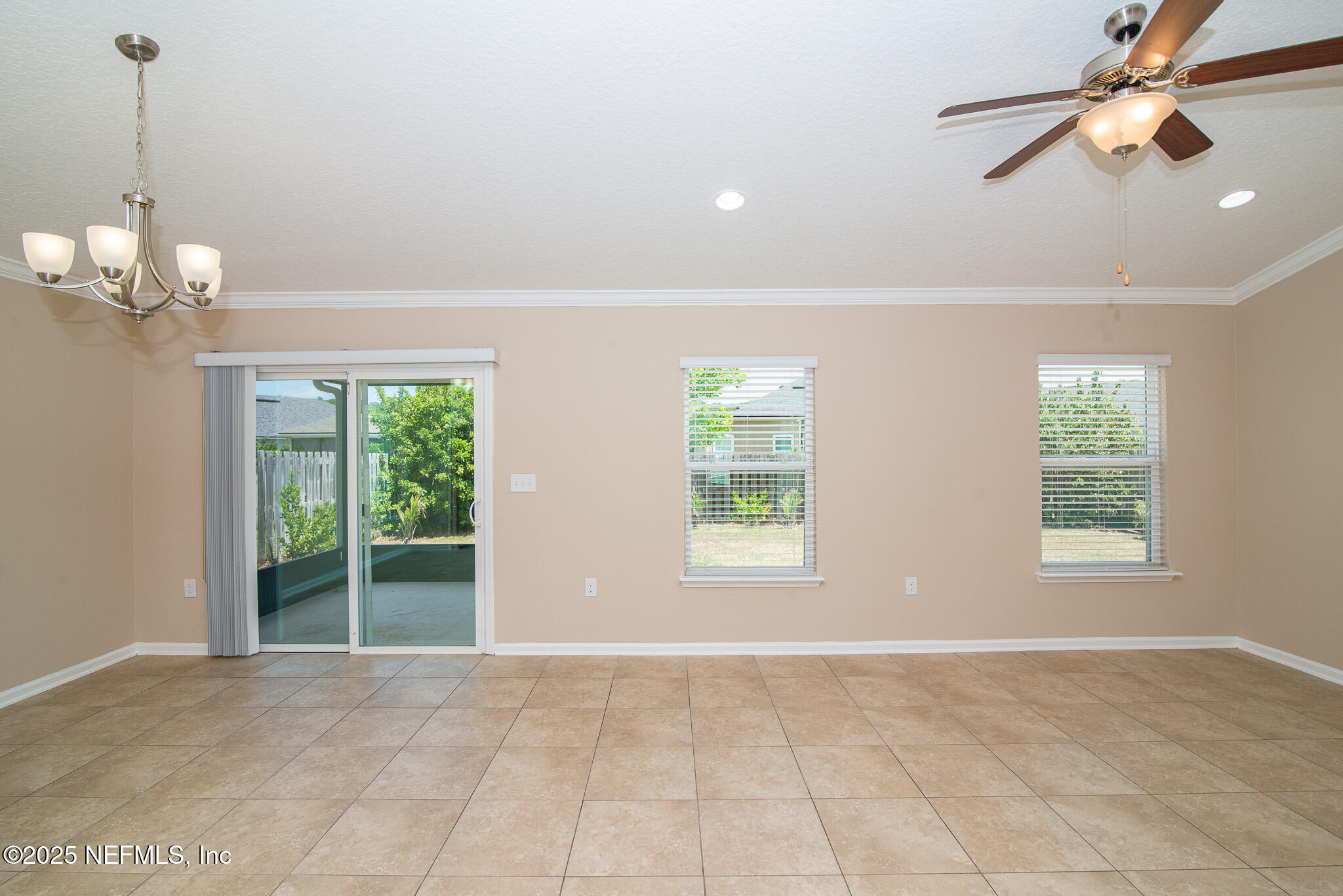 414 Samara Lakes Parkway St. Augustine, FL 32092 - Photo 15 of 26 a view of an empty room with a window