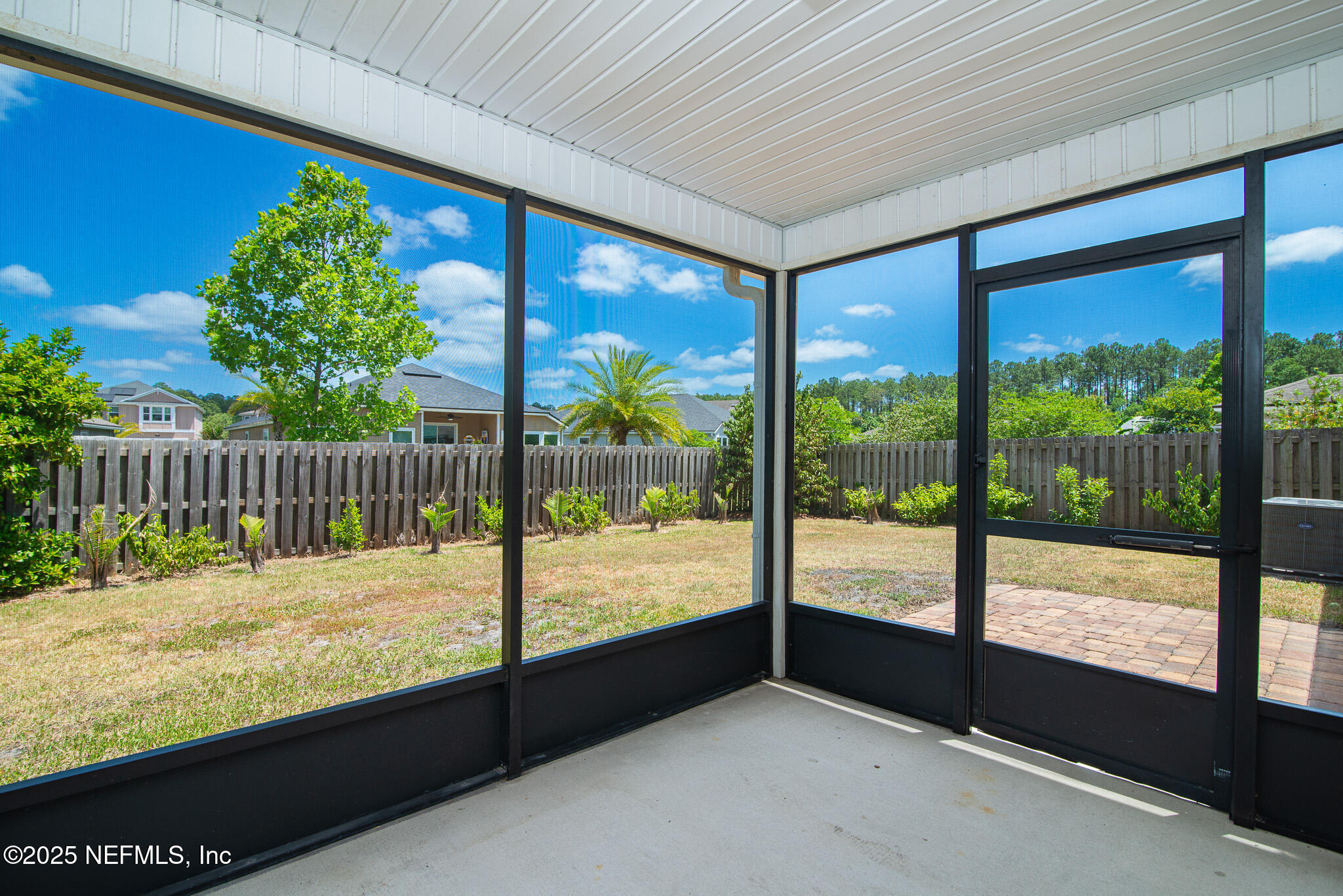 414 Samara Lakes Parkway St. Augustine, FL 32092 - Photo 21 of 26 a view of a room with a large window