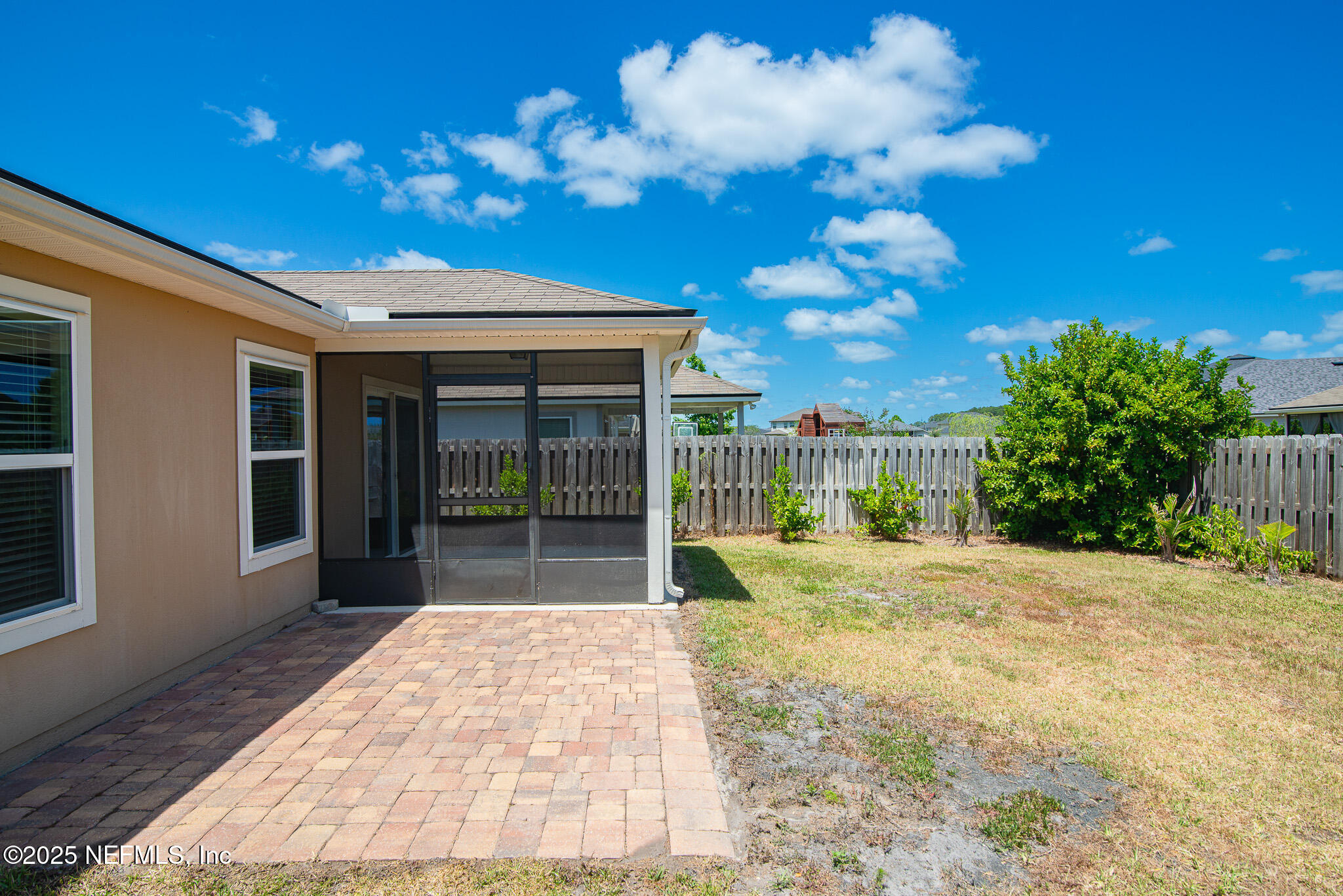 414 Samara Lakes Parkway St. Augustine, FL 32092 - Photo 26 of 26 a view of a porch with a backyard