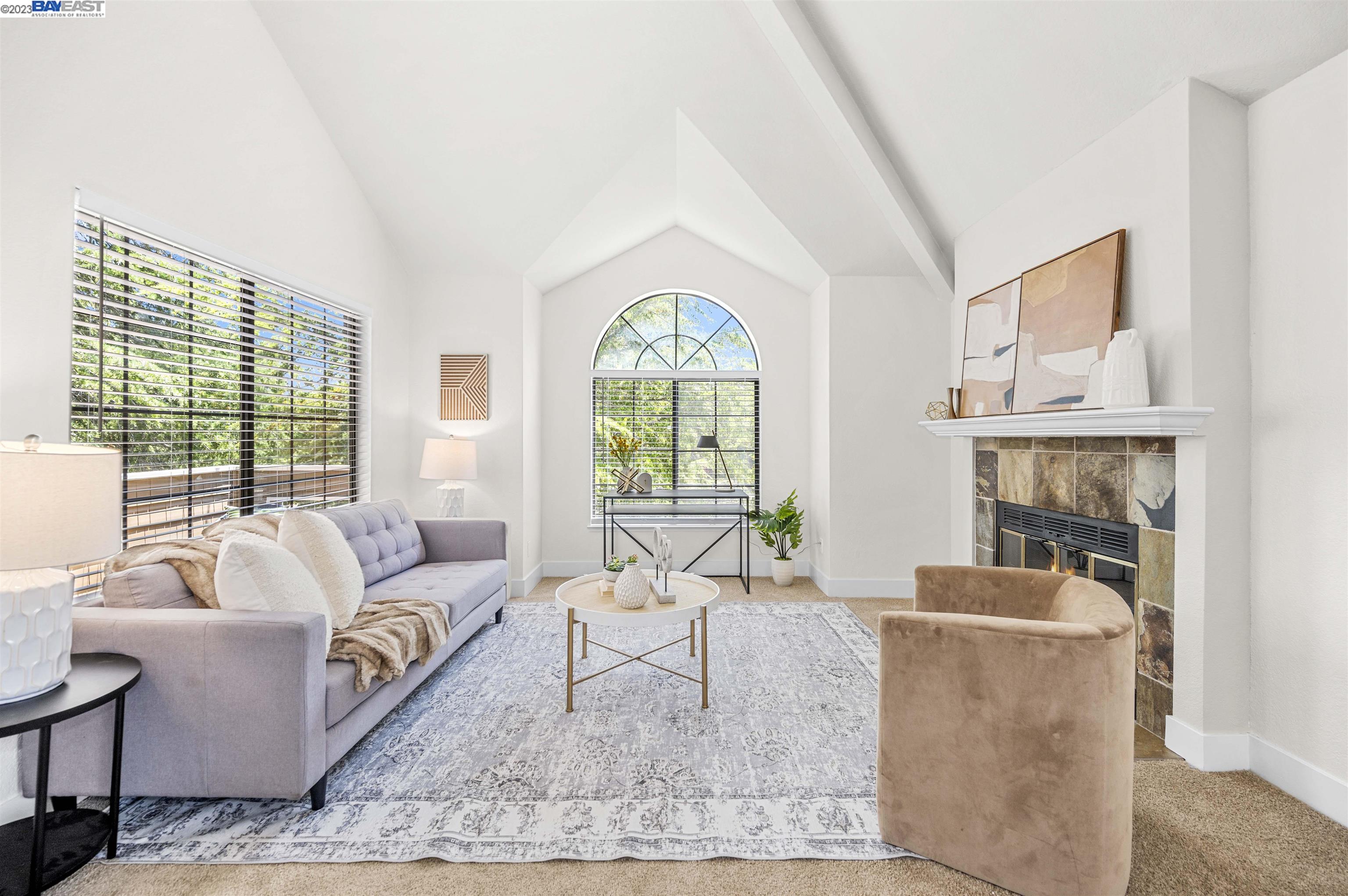 445 Pine Ridge Drive San Ramon, CA 94582 - Photo 1 of 1 a living room with furniture a large window and a fireplace