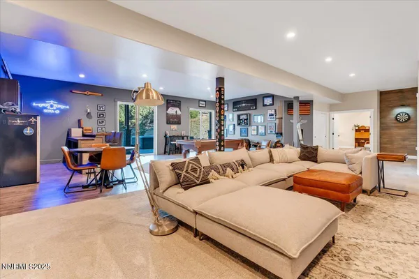a living room with furniture and a table