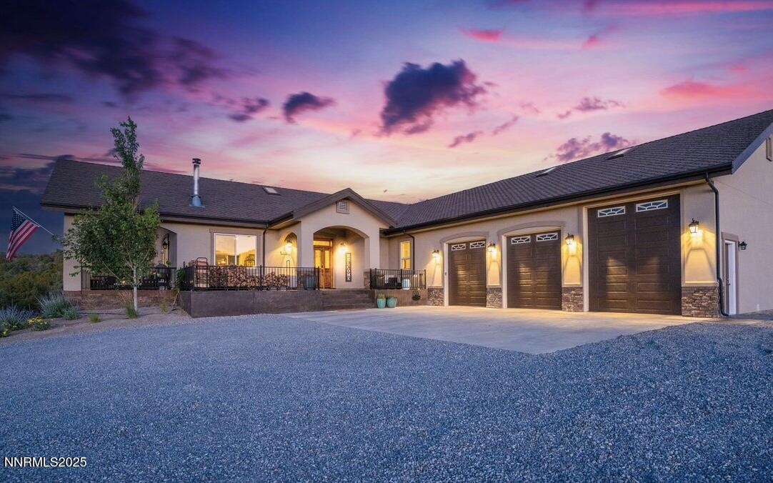 4610 Tybo Road Reno, NV 89521 - Photo 47 of 47 a view of a house with large outdoor space and a car parked in front of it