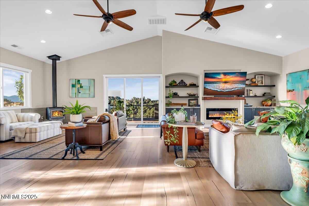 4610 Tybo Road Reno, NV 89521 - Photo 6 of 47 a living room with fireplace furniture and a window