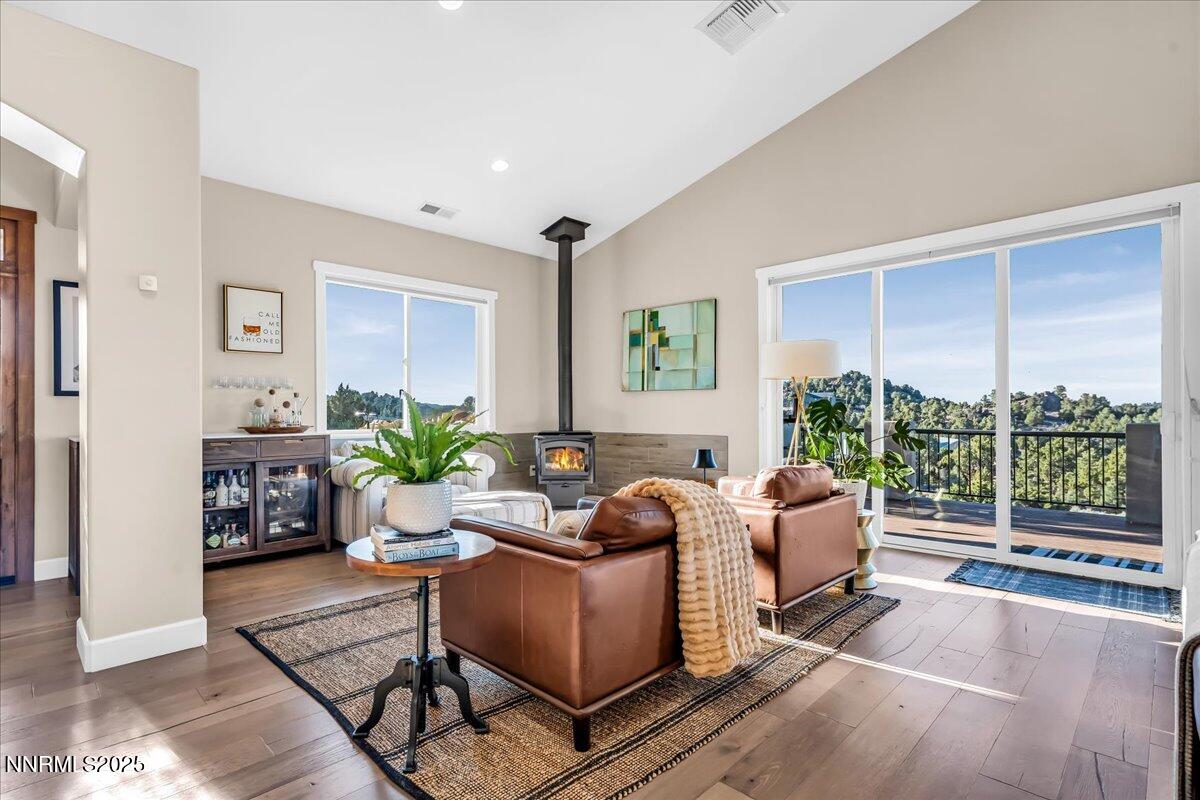 4610 Tybo Road Reno, NV 89521 - Photo 9 of 47 a living room with furniture and a floor to ceiling window