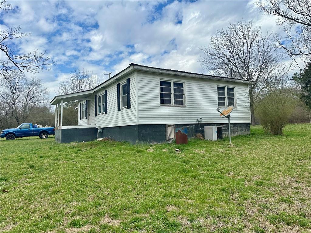 456 Cummings Road Trion, GA 30753 - Photo 3 of 13 a house view with a garden space