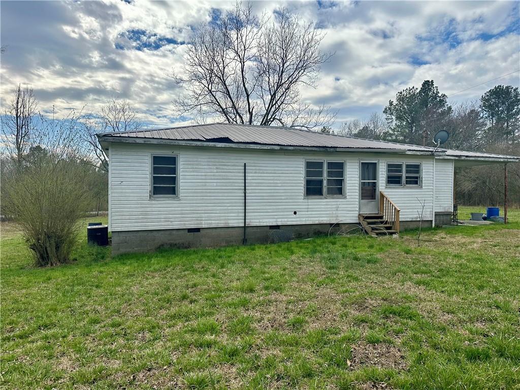 456 Cummings Road Trion, GA 30753 - Photo 5 of 13 a view of a house with backyard
