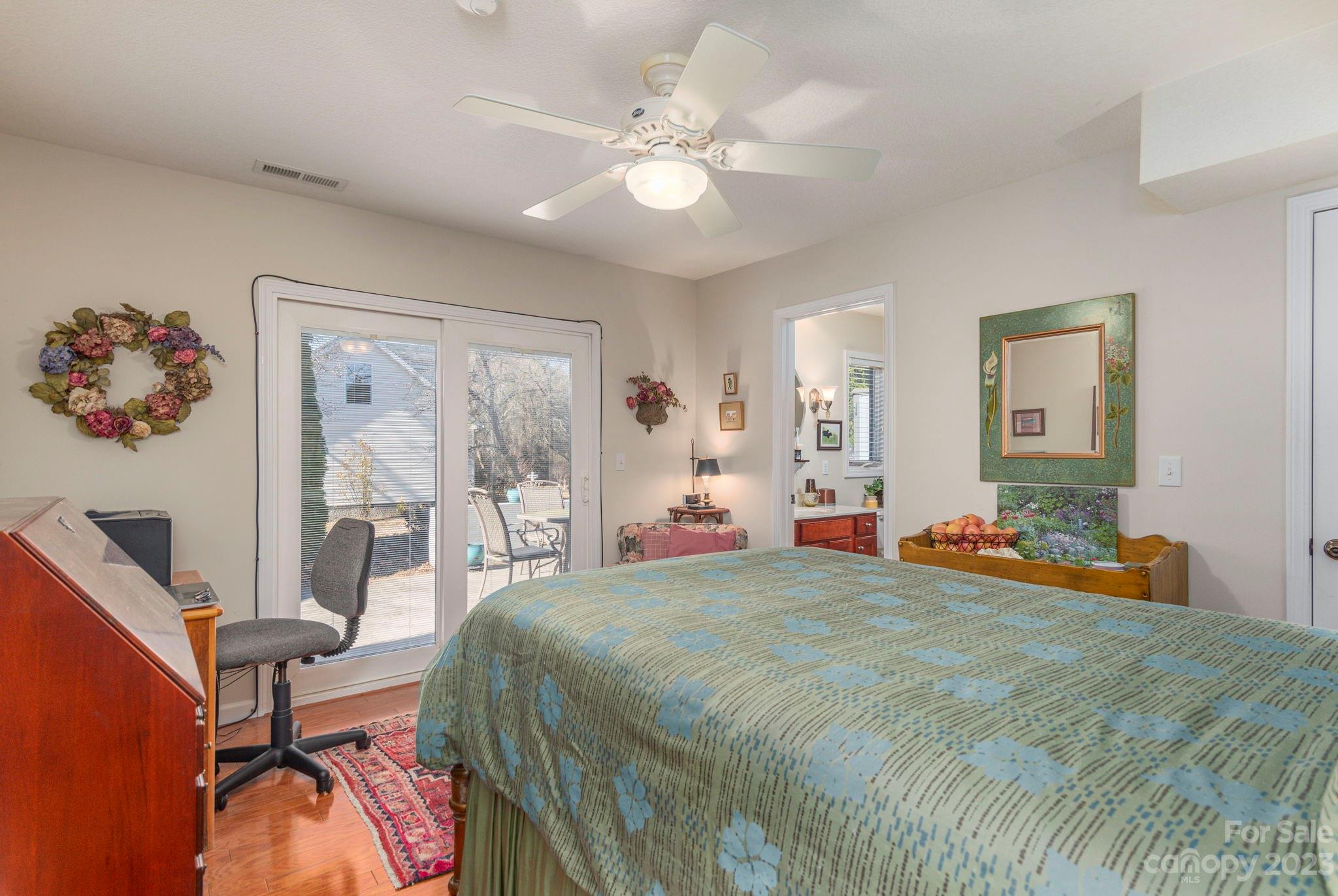 448 Kyfields Weaverville, NC 28787 - Photo 15 of 25 a bedroom with a bed and wooden floor