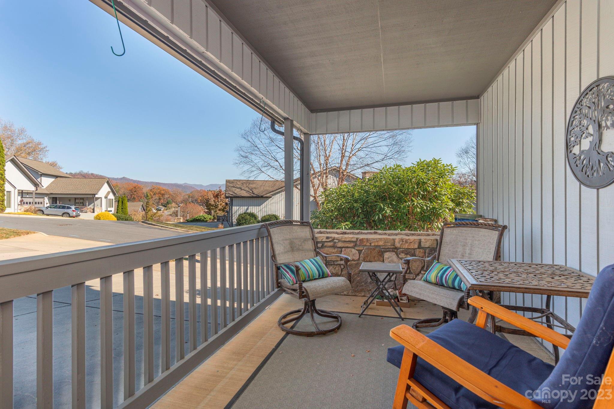 448 Kyfields Weaverville, NC 28787 - Photo 2 of 25 a balcony with wooden benches