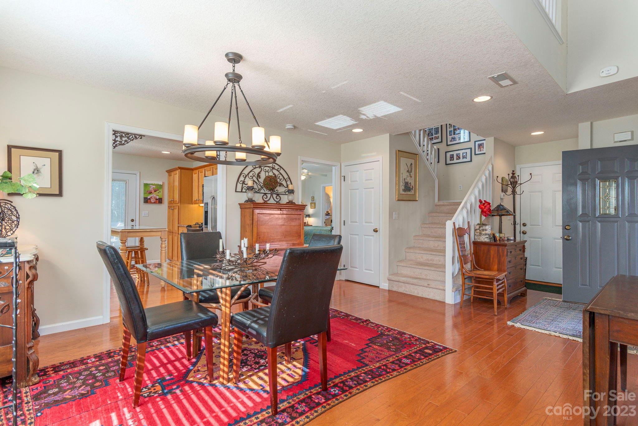 448 Kyfields Weaverville, NC 28787 - Photo 9 of 25 a living room with dining room and wooden floor