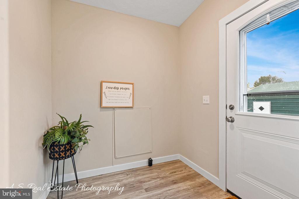 34820 Bi State Boulevard Delmar, DE 19940 - Photo 15 of 15 a view of a hallway with a potted plant
