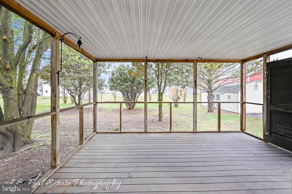 34820 Bi State Boulevard Delmar, DE 19940 - Photo 8 of 15 a view of outdoor space with wooden floor and windows