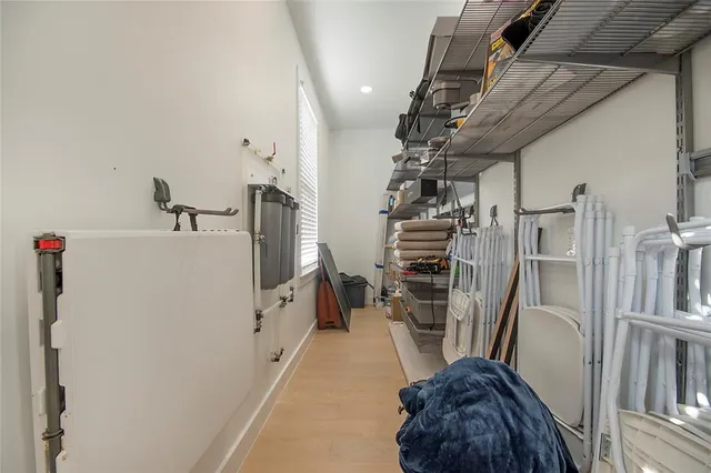 a room with furniture and a flat screen tv