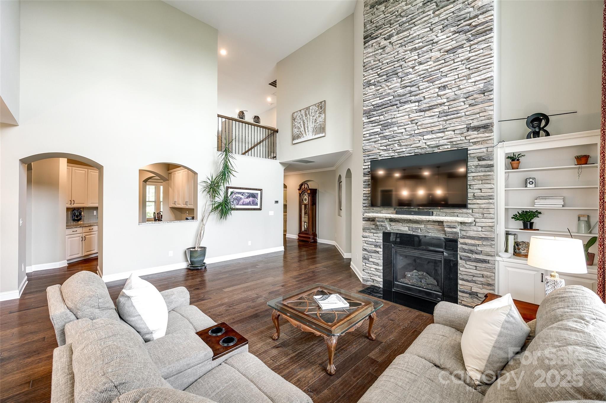 4220 Thames Circle Fort Mill, SC 29715 - Photo 12 of 44 a living room with fireplace furniture and a flat screen tv