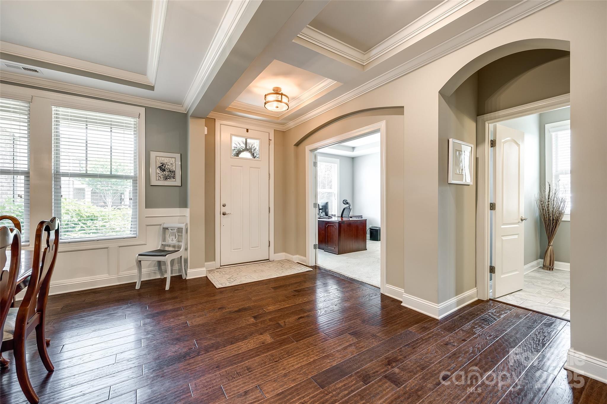 4220 Thames Circle Fort Mill, SC 29715 - Photo 3 of 44 a view of a livingroom with wooden floor and furniture