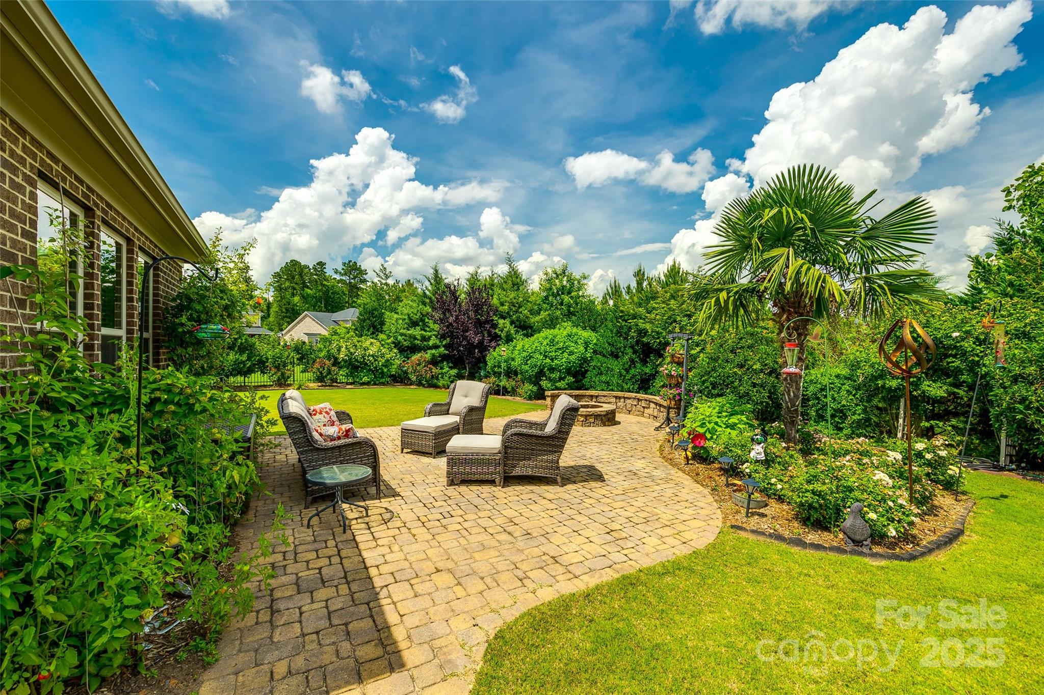 4220 Thames Circle Fort Mill, SC 29715 - Photo 33 of 44 a view of a patio with couches table and chairs and potted plants