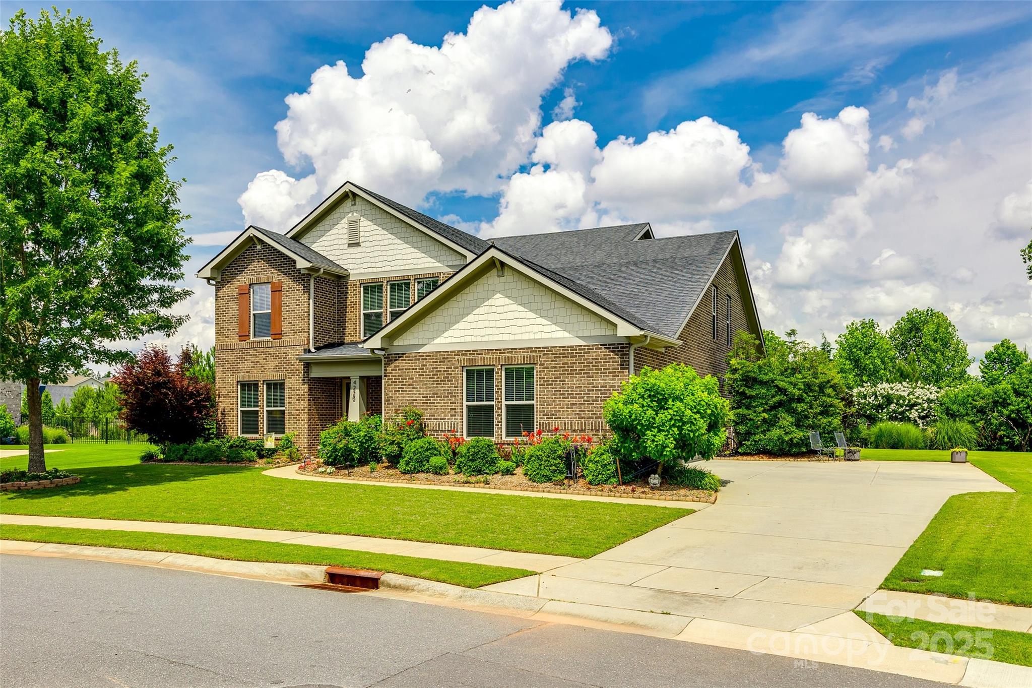 4220 Thames Circle Fort Mill, SC 29715 - Photo 39 of 44 a front view of house with yard and green space