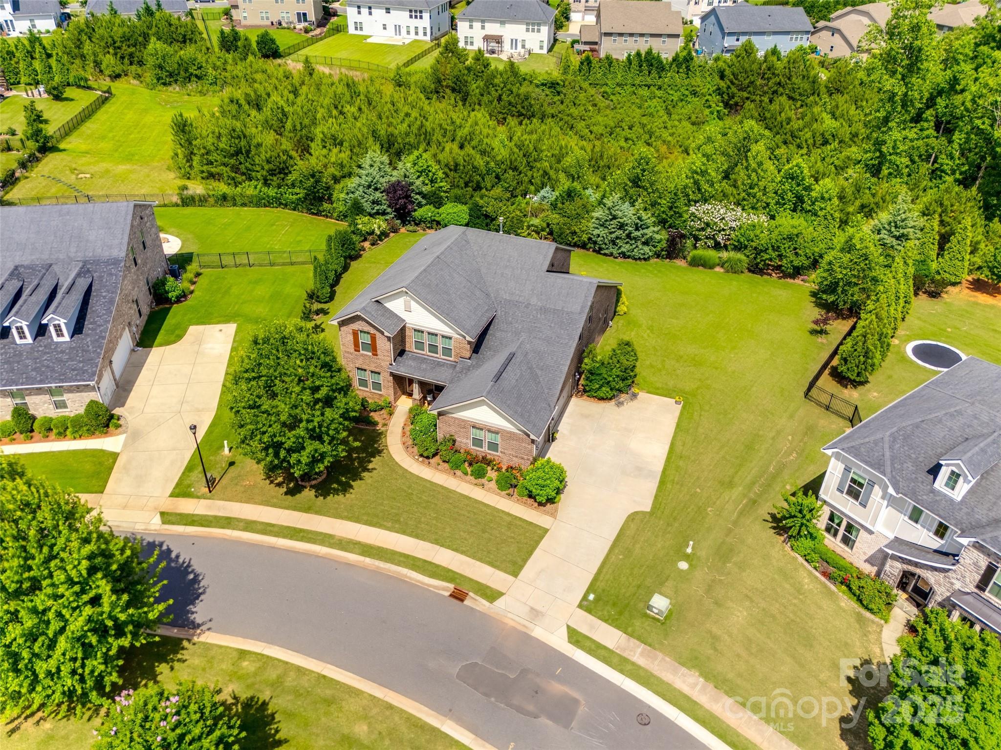 4220 Thames Circle Fort Mill, SC 29715 - Photo 40 of 44 an aerial view of residential houses with outdoor space