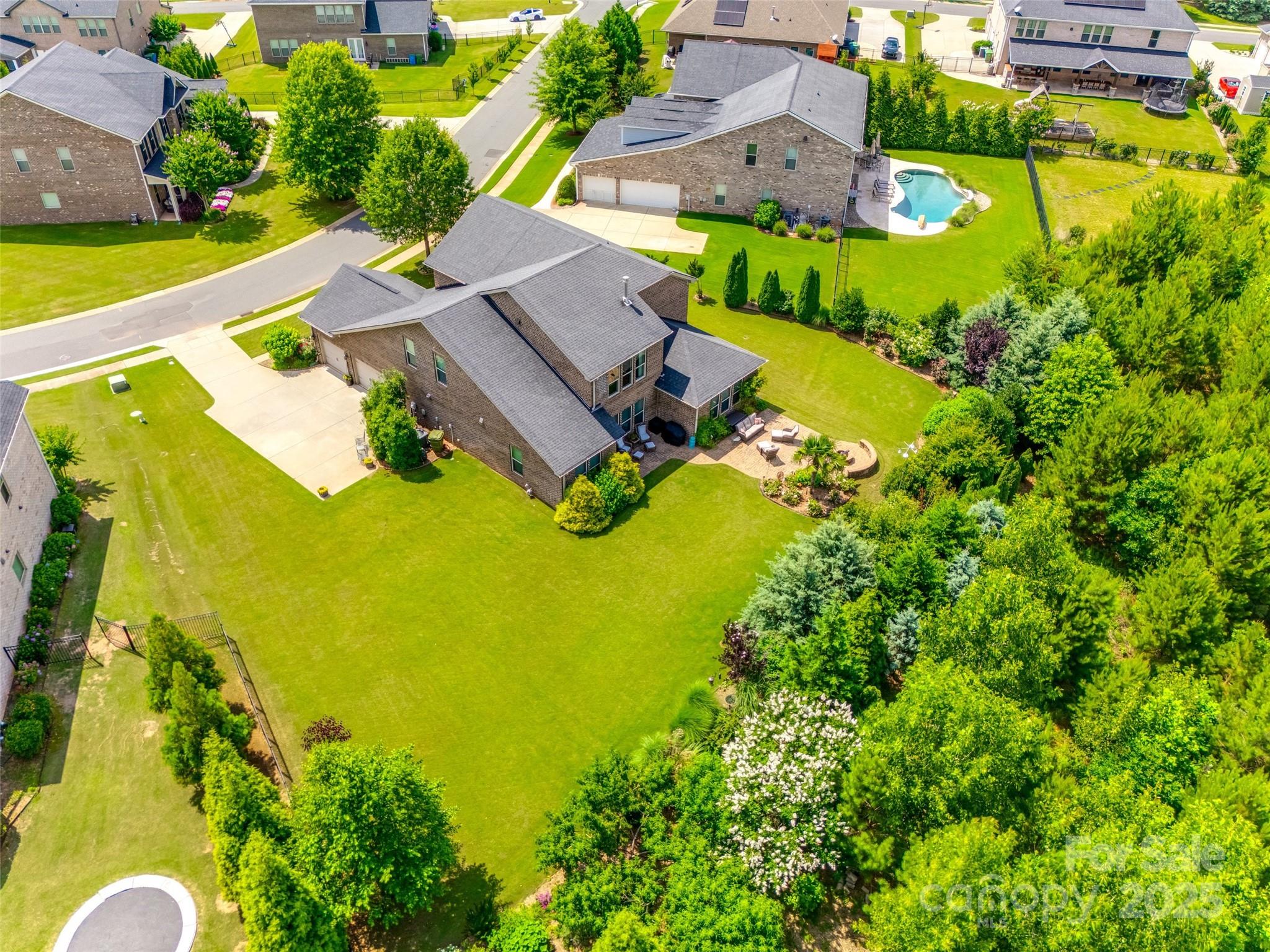 4220 Thames Circle Fort Mill, SC 29715 - Photo 41 of 44 an aerial view of a residential house with swimming pool