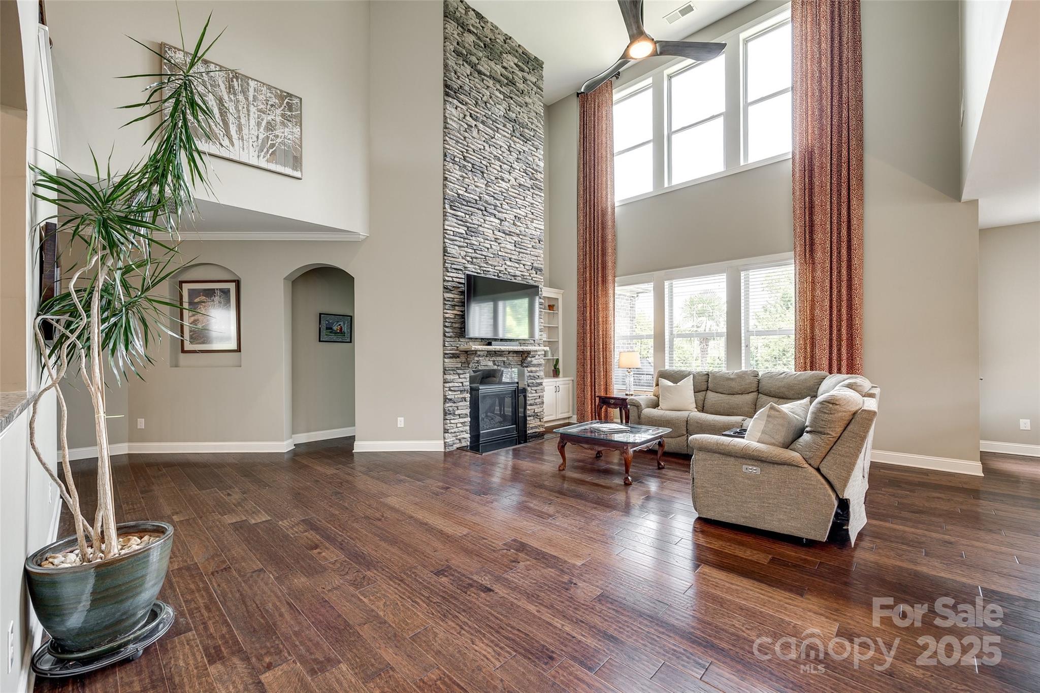 4220 Thames Circle Fort Mill, SC 29715 - Photo 10 of 44 a living room with furniture window and wooden floor