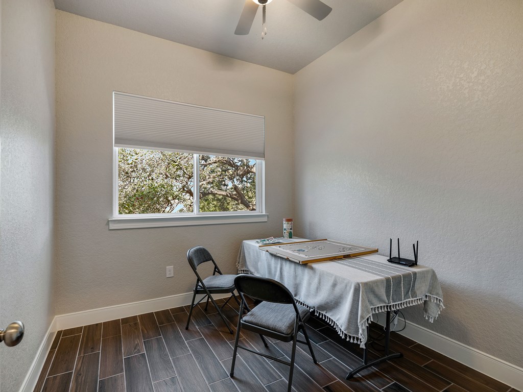 238 Roy Nichols Blanco, TX 78606 - Photo 20 of 25 a dining room with a table and chairs