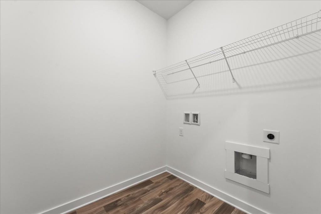 526 Lillian Way Statham, GA 30666 - Photo 13 of 56 a room with linen closet and fire place