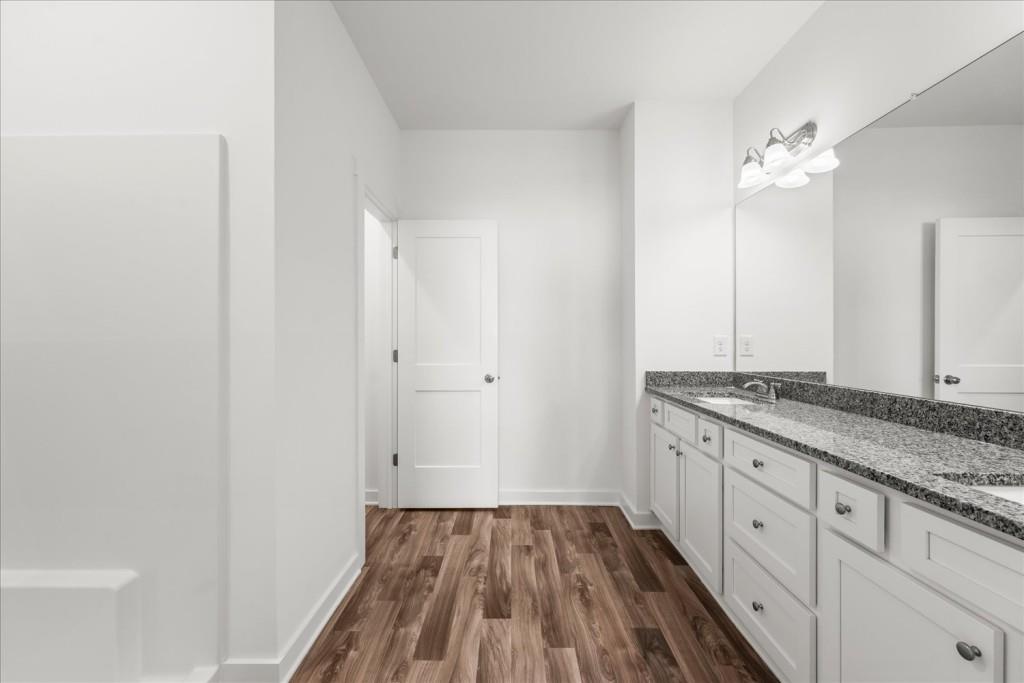 526 Lillian Way Statham, GA 30666 - Photo 17 of 56 a view of a kitchen from the hallway