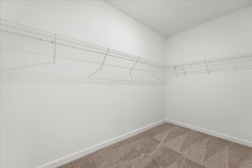526 Lillian Way Statham, GA 30666 - Photo 21 of 56 a view of a room with racks on the wall