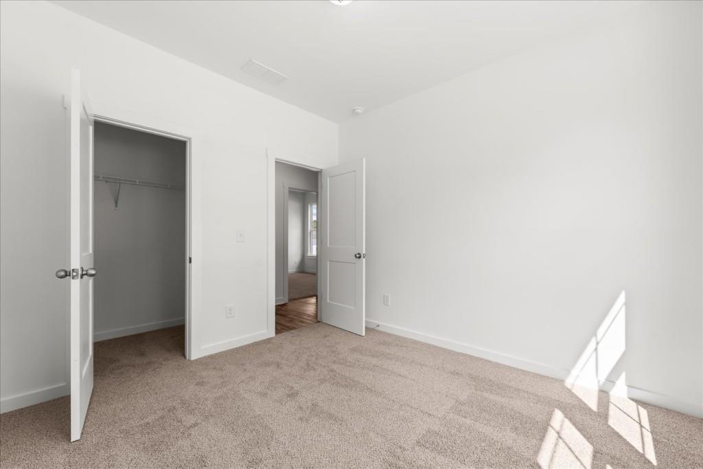 526 Lillian Way Statham, GA 30666 - Photo 8 of 56 a view of an empty room