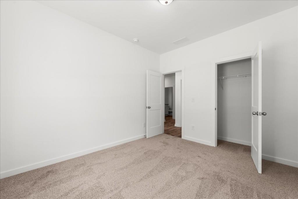 526 Lillian Way Statham, GA 30666 - Photo 10 of 56 a view of an empty room