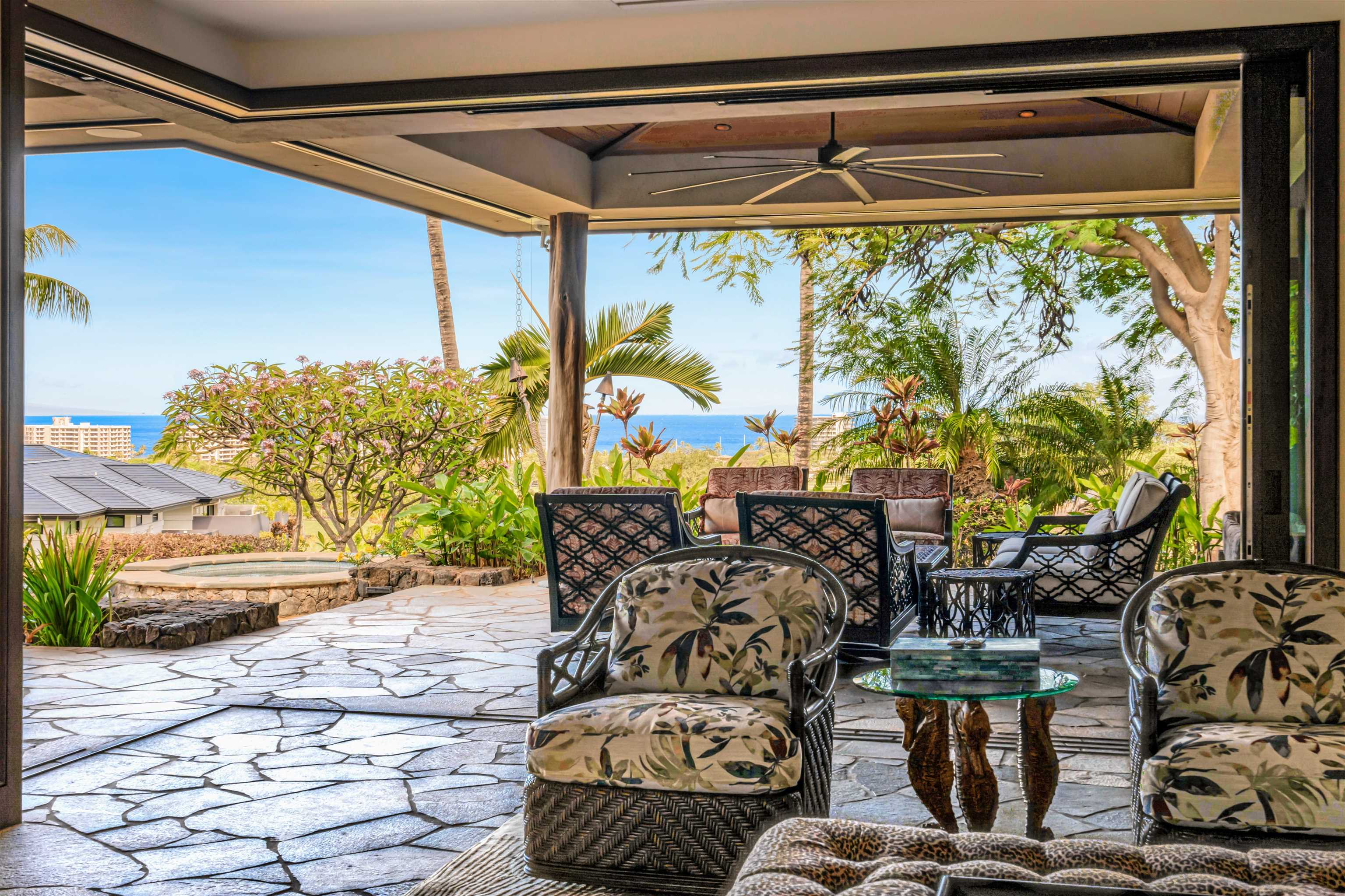 137 Anapuni Loop Lahaina, HI 96761 - Photo 12 of 47 a view of a living room and a floor to ceiling window