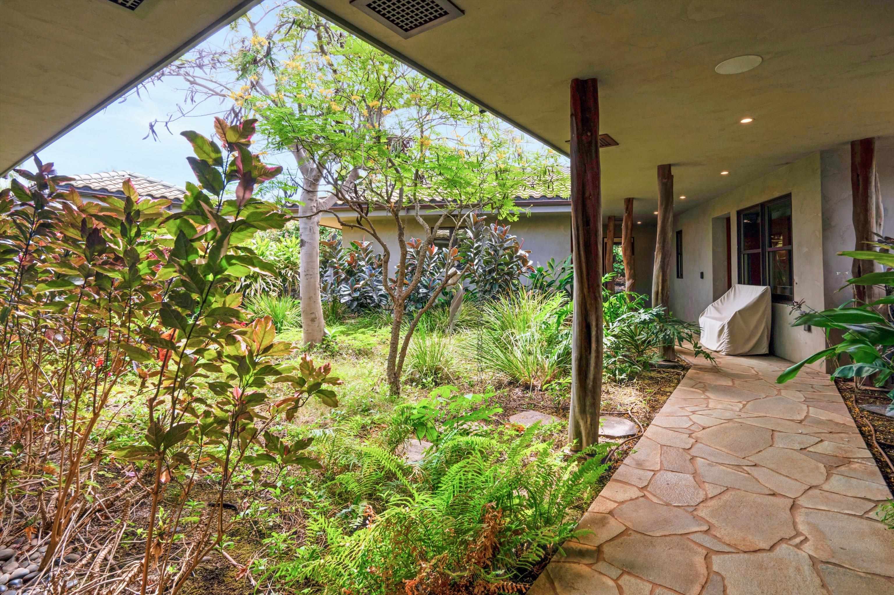 137 Anapuni Loop Lahaina, HI 96761 - Photo 34 of 47 a view of backyard with garden
