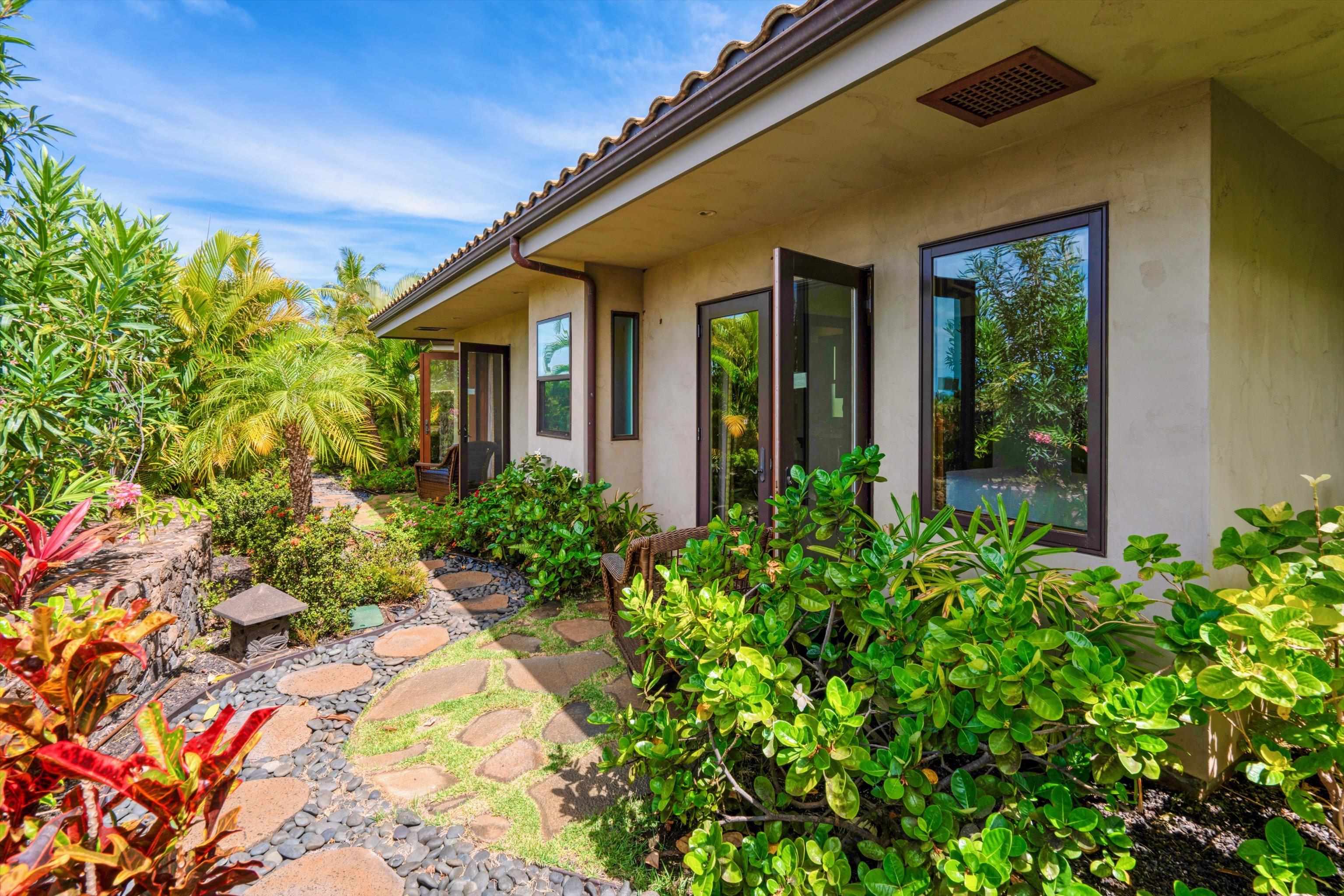 137 Anapuni Loop Lahaina, HI 96761 - Photo 39 of 47 a view of a house with potted plants