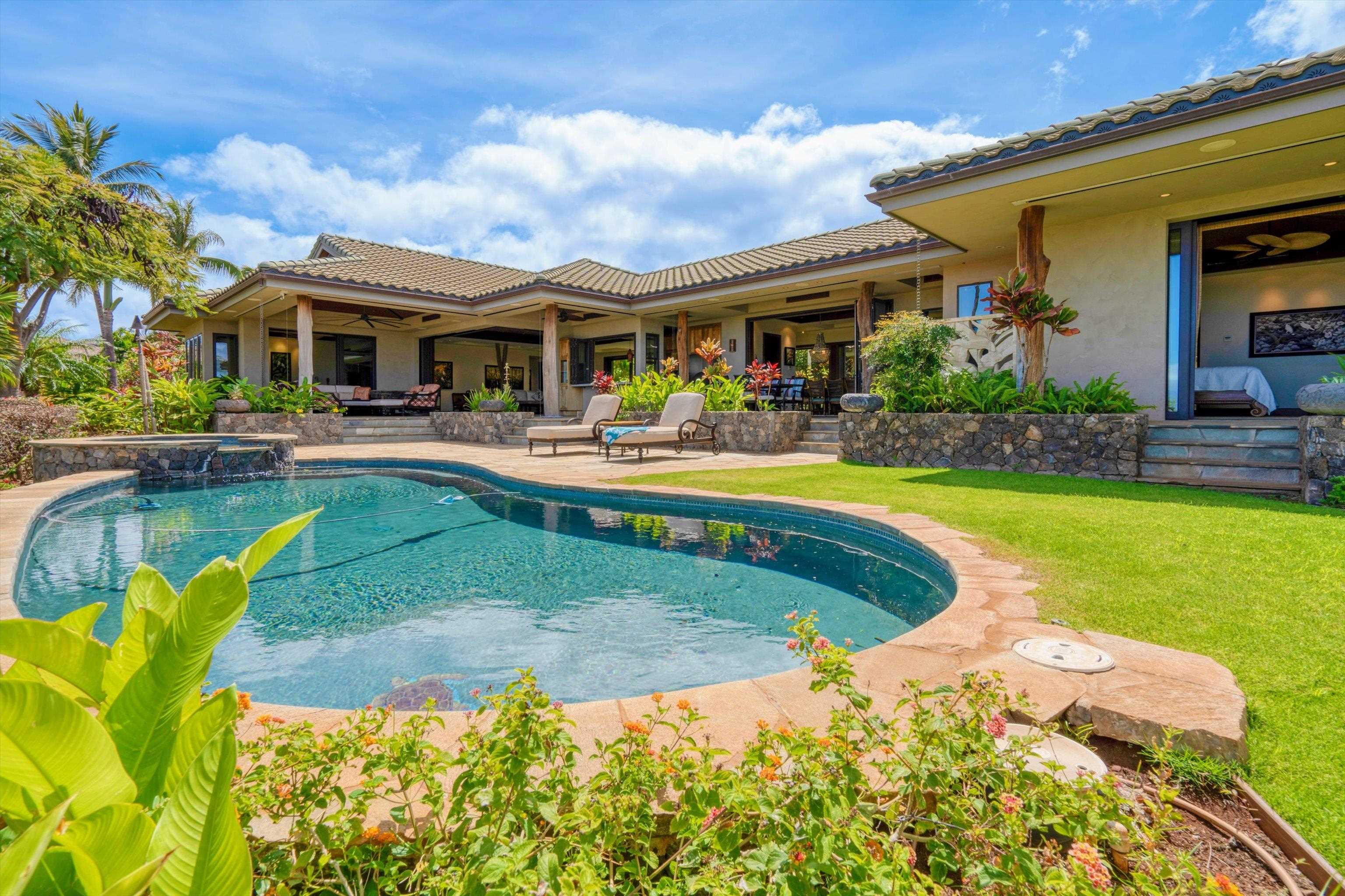 137 Anapuni Loop Lahaina, HI 96761 - Photo 40 of 47 a view of a house with swimming pool and sitting area