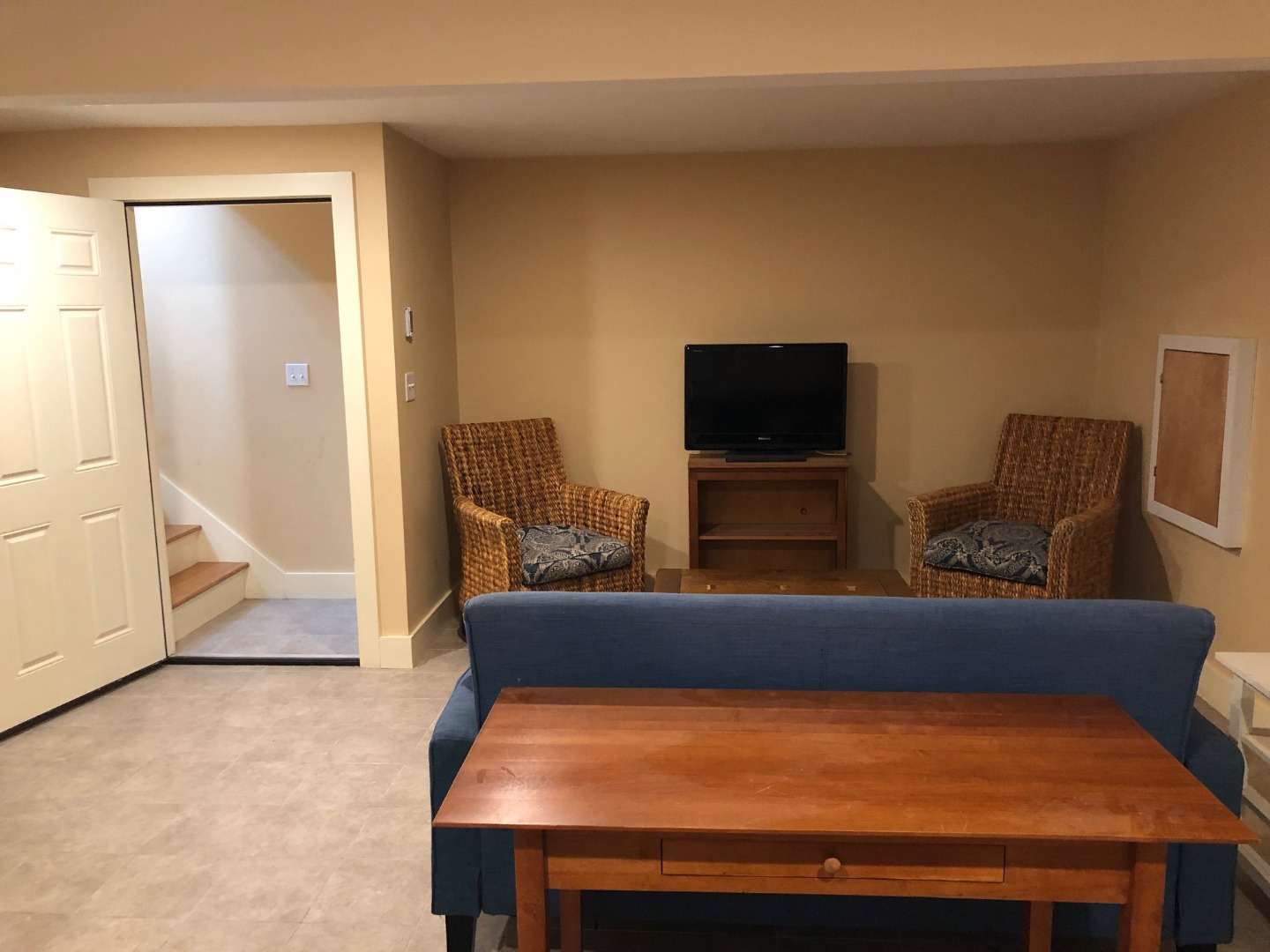 3 A Sun Island Road, Unit 4 Nantucket, MA 02554 - Photo 12 of 17 a living room with furniture and a flat screen tv