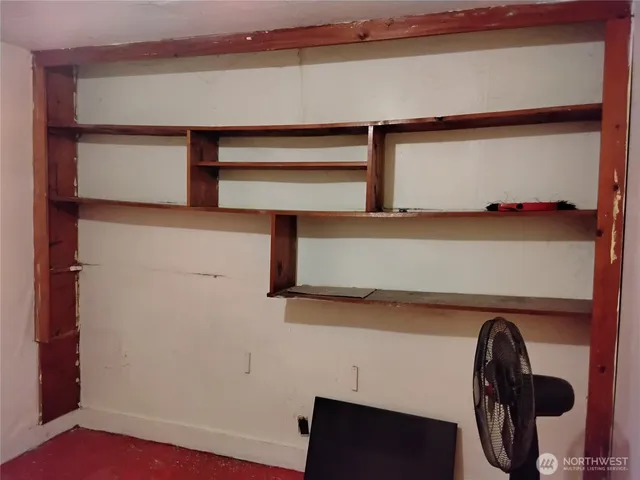 a view of an empty walk in closet