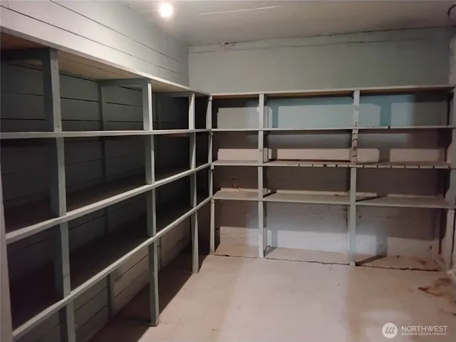 a view of a wooden door and a yard