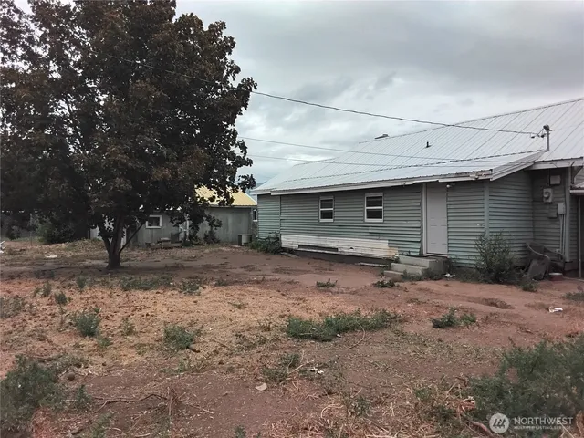 a kitchen with a sink and a stove