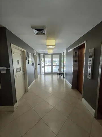 a view of elevator with hallway