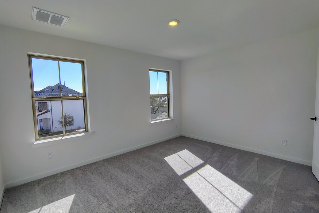 1804 Spg Mountain Cove Georgetown, TX 78628 - Photo 16 of 32 an empty room with windows